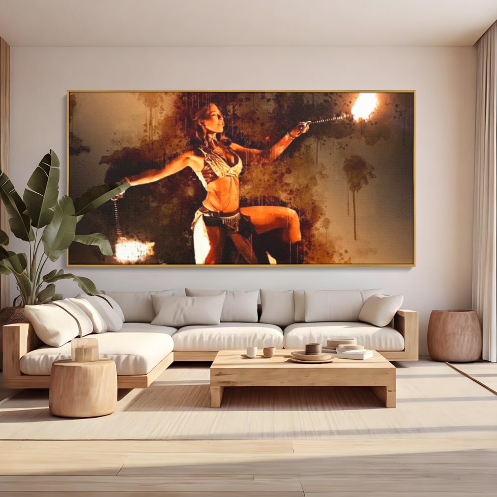 Tablou canvas cu tablou canvas cu dansatoare de foc, in rama de aluminiu auriu, pe perete intr-un living